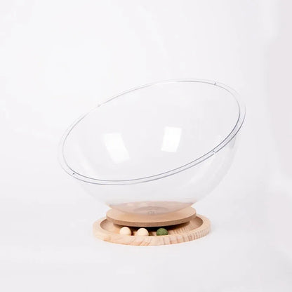 Transparent acrylic space capsule cat bed on a turntable base for cats.