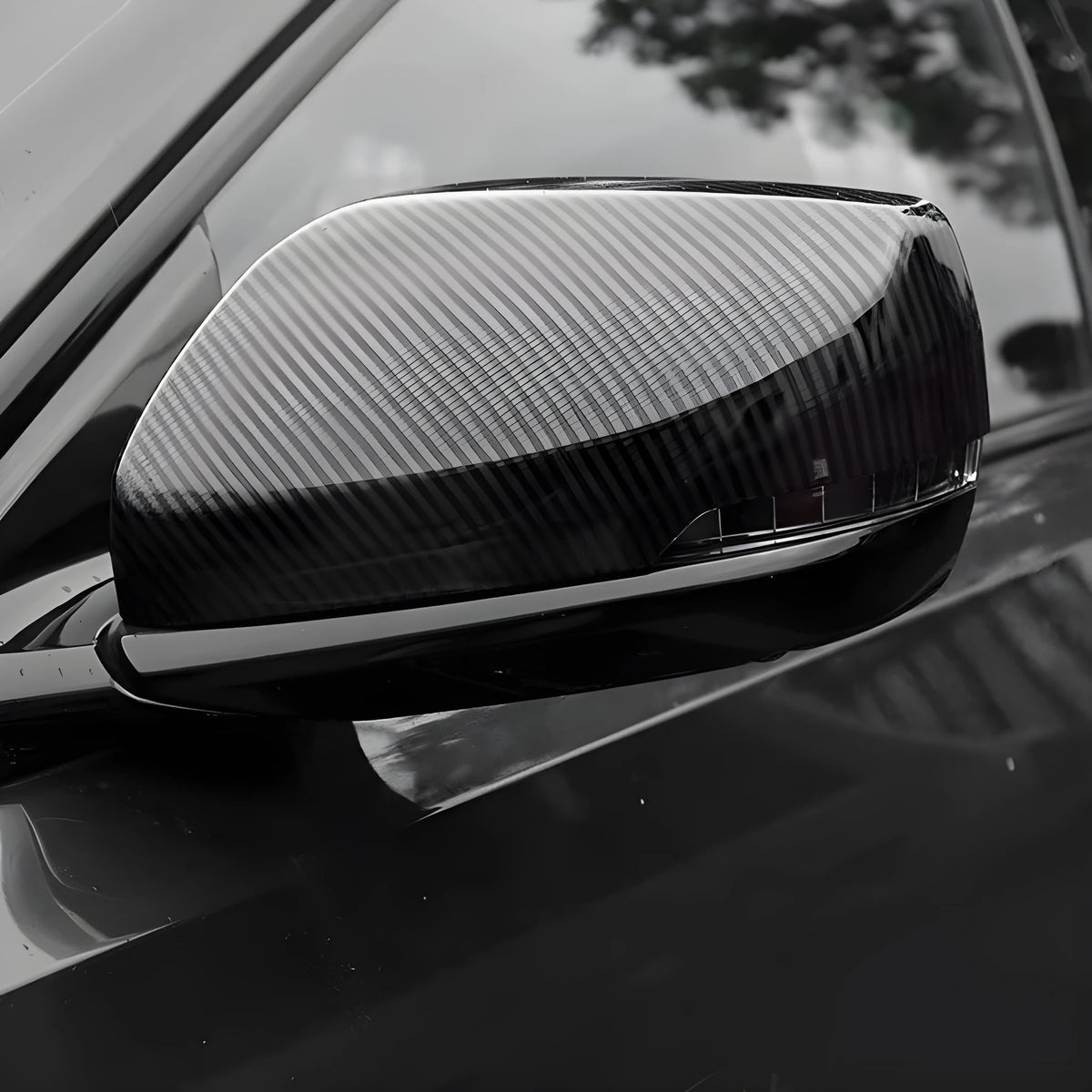 Pair of ABS plastic mirror covers for Cadillac CT5 CT6 in carbon fibre, silver, and rain frame finishes.