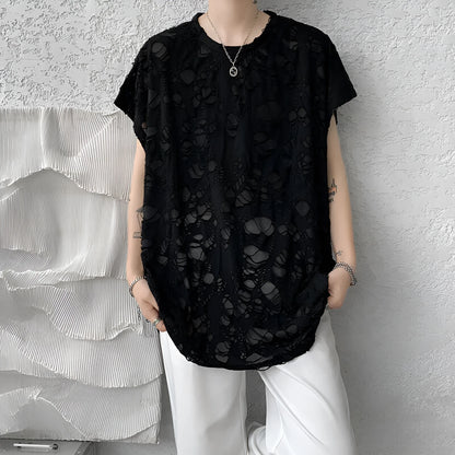 Black loose-fit sleeveless vest with ripped detail and wide shoulders, showcasing Japanese retro style.