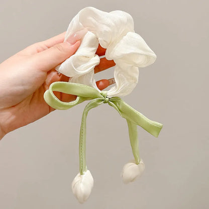 Korean style tulip children's fabric headband in knitted construction with flower detailing