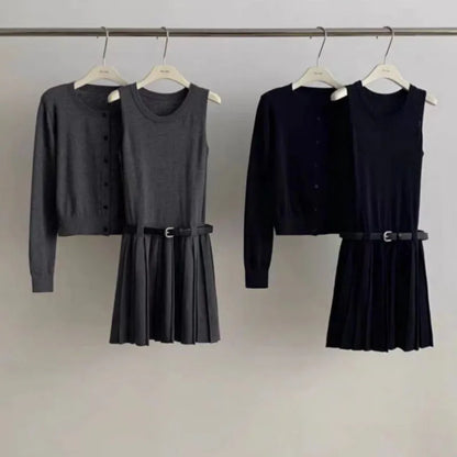 Women's grey knitted vest skirt and cardigan set with 3D pattern, adjustable belt, and pleating detail