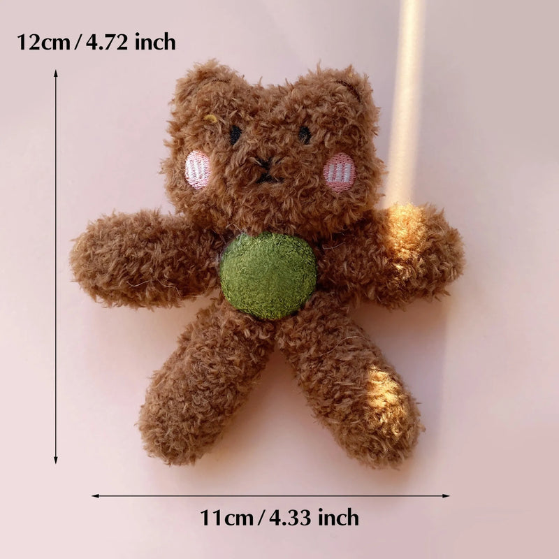 Catnip ball edible catnip chewing toy for indoor cats, interactive snack ball stuffed with cat grass for cleaning kitten teeth, available in brown bear, bunny, frog, panda, or tiger designs, measuring 12.5 by 11 cm.