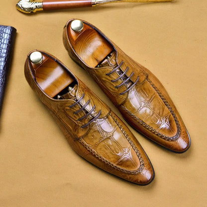 Black men's leather casual shoes with alligator pattern and metal horse bit buckle on a rubber sole.