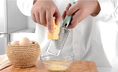 Nine-piece kitchen utensil set with stainless steel heads and plastic handles in four colour variations