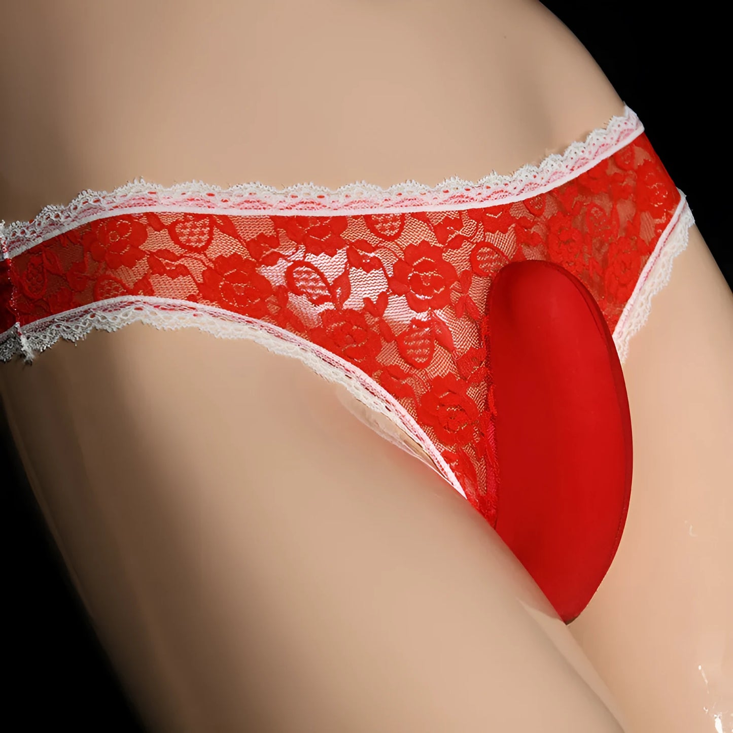 Men's lace triangle underwear with vertical pouch design in red colour on a mannequin.