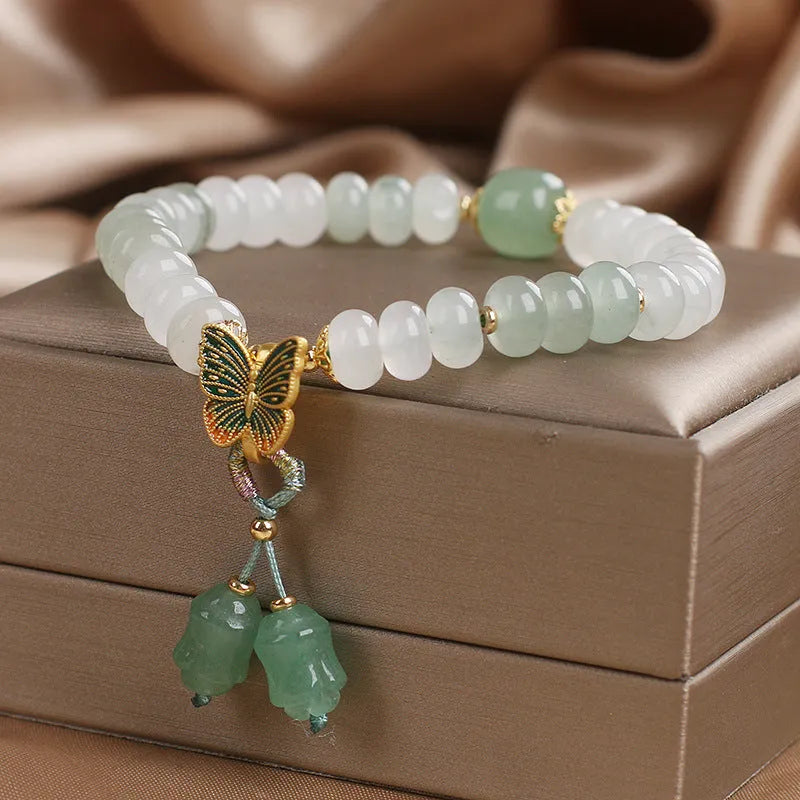 Green crystal abacus beads bracelet with retro butterfly charm and tassel decoration