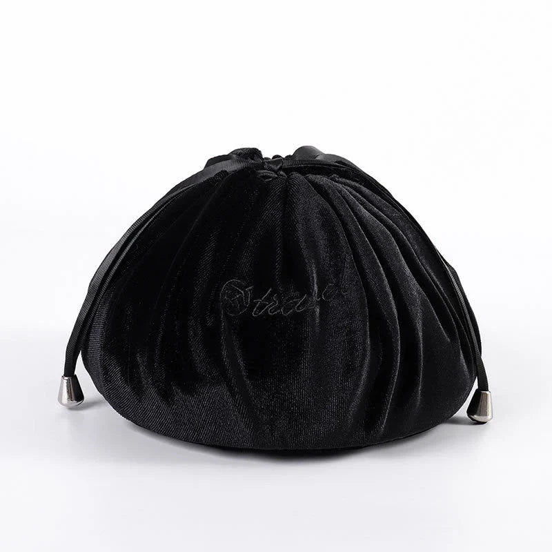 Adorable rabbit ear velvet cosmetic bags in various colors for storing and organizing makeup, toiletries, and other beauty essentials.