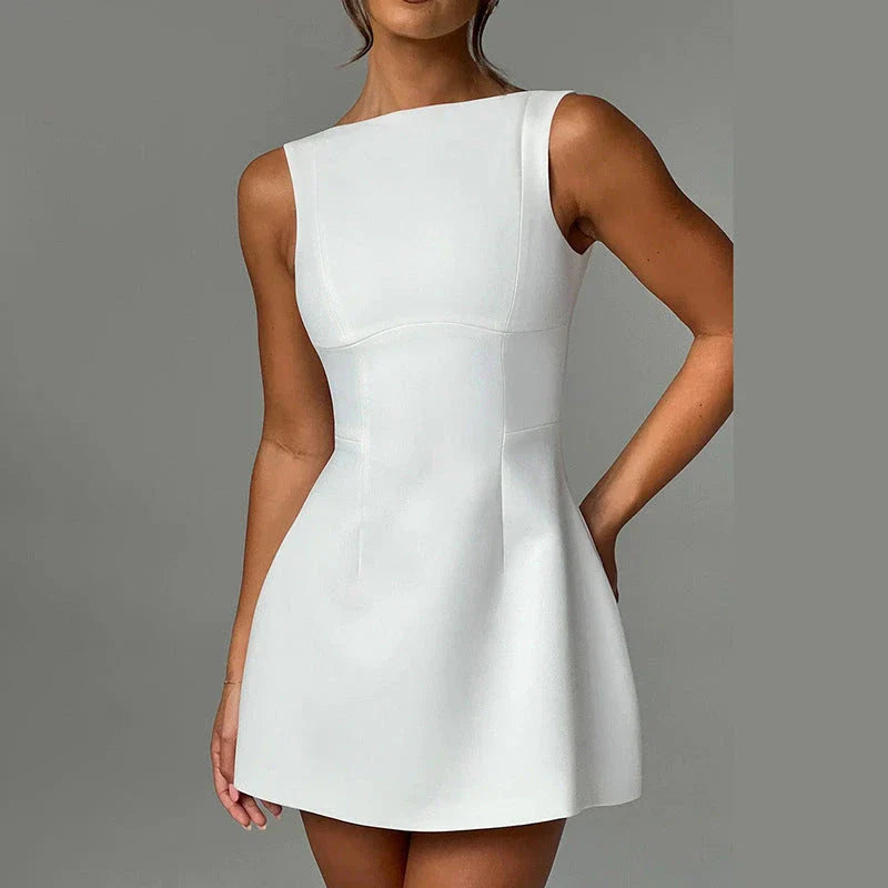 Alluring backless mini dress in sleek and stylish summer designs with a figure-flattering fit and range of chic color options