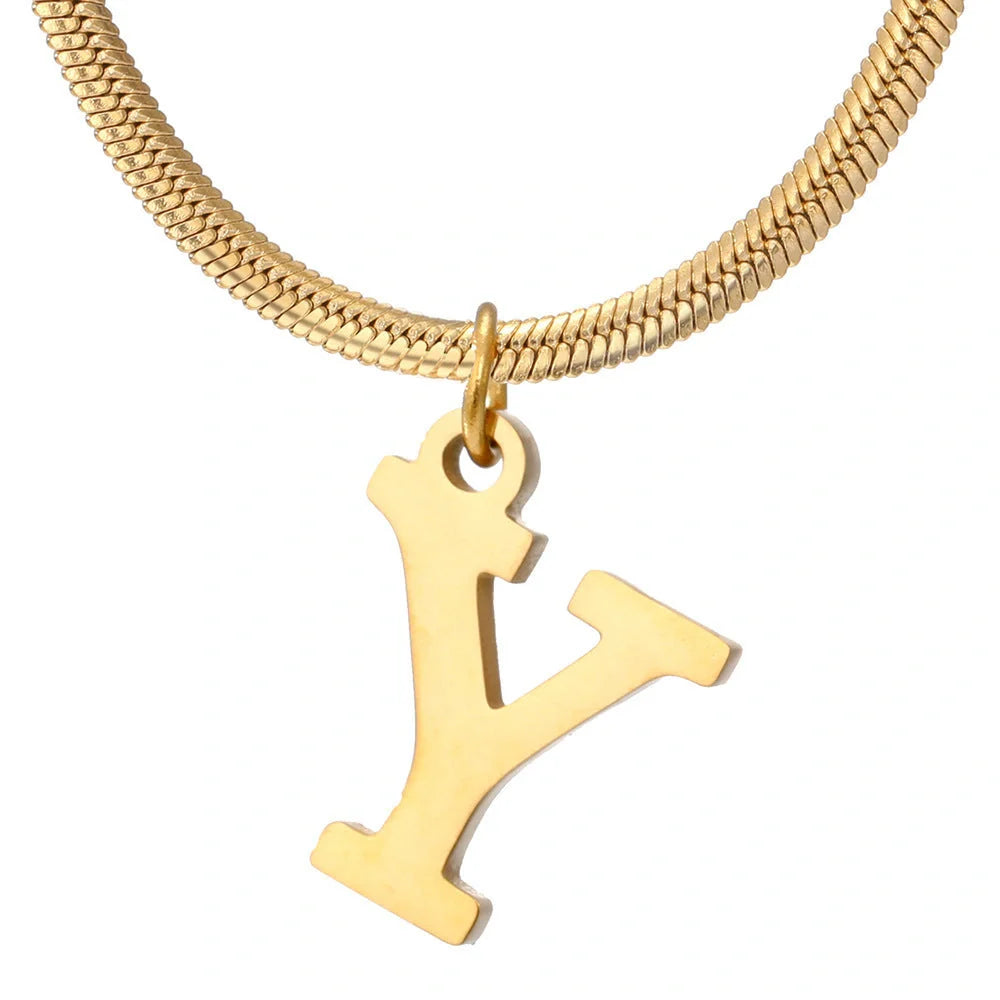 Elegant gold A-Z letter pendant necklace on a snake chain