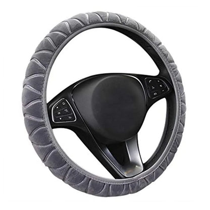 Short plush steering wheel cover in one of seven colours, fitting a 38cm steering wheel with non-slip grip