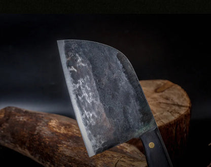 Hand-made stainless steel meat cleaver with a 17cm round head blade on a kitchen surface.