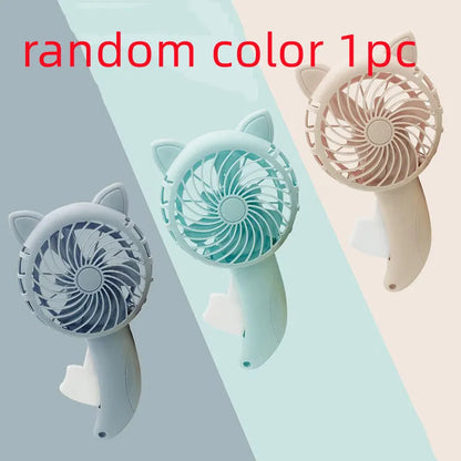 Large plastic cartoon hand-press fan toy for children measuring 11 by 20 centimetres