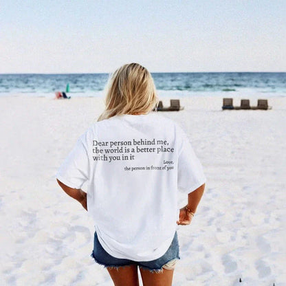 Stylish women's graphic t-shirt with trendy slogan, featuring a vibrant print design and comfortable short sleeve silhouette.