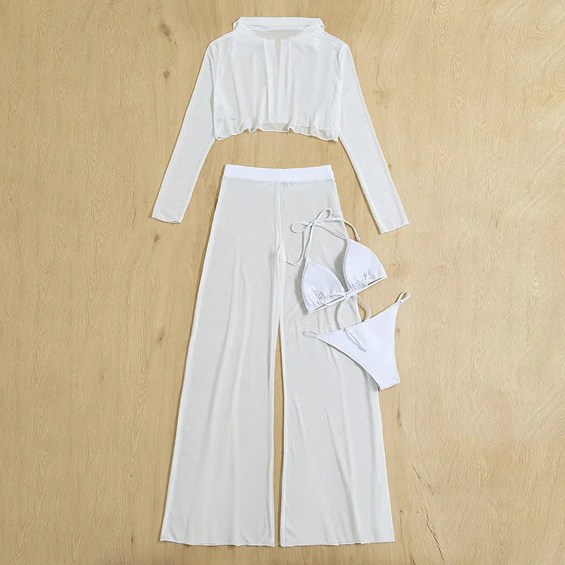 White women's four-piece swimsuit set with high-waist trousers and backless design
