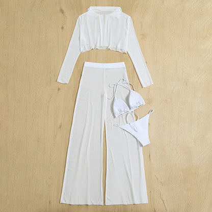 White women's four-piece swimsuit set with high-waist trousers and backless design