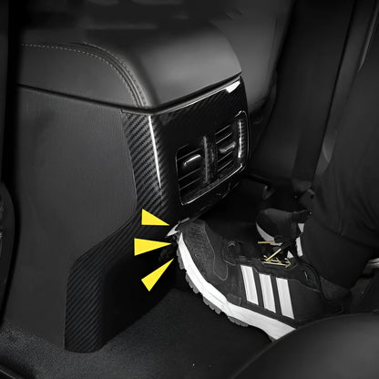 Carbon fibre patterned left and right steering wheel frame overlays for car interior upgrade.
