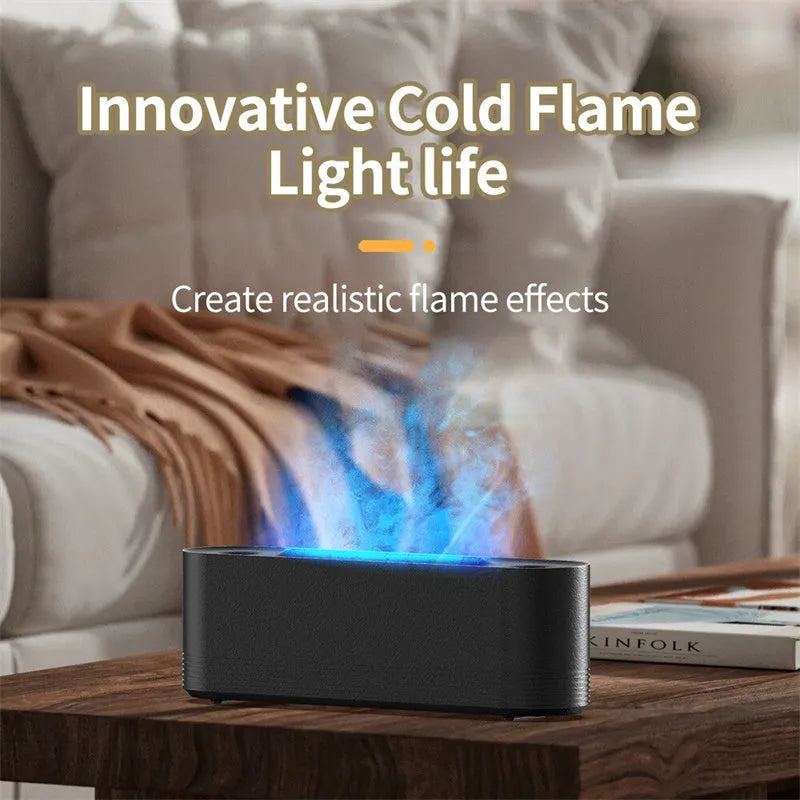 Black ultrasonic humidifier diffuser emitting cool mist with multi-colour LED flame light effect on a wooden surface.