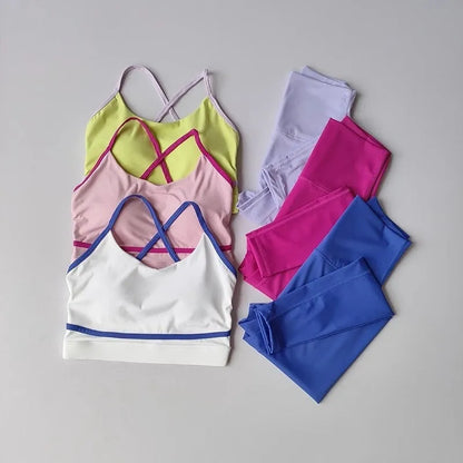 Women's blue and white sleeveless tank top and cropped yoga pants sportswear set