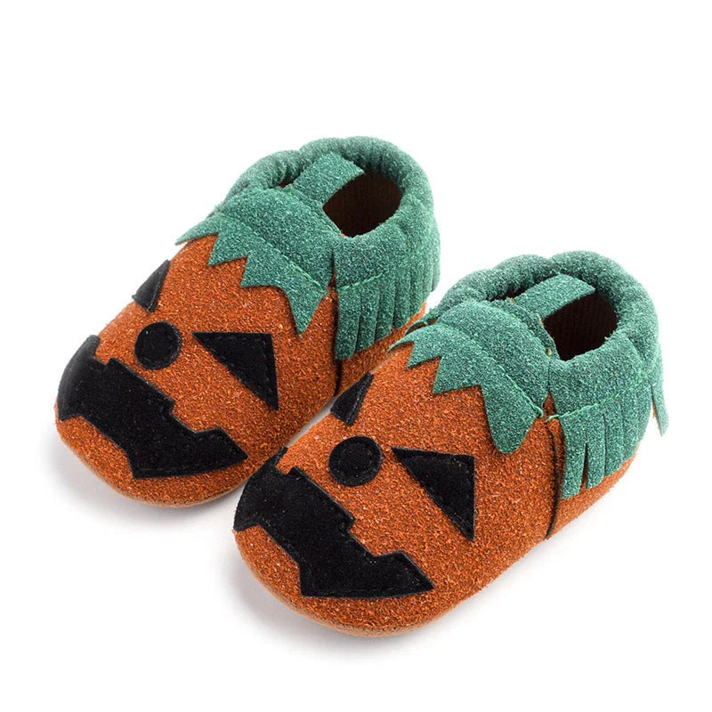 Pumpkin-themed costume shoes for toddlers and young children in various sizes and colours