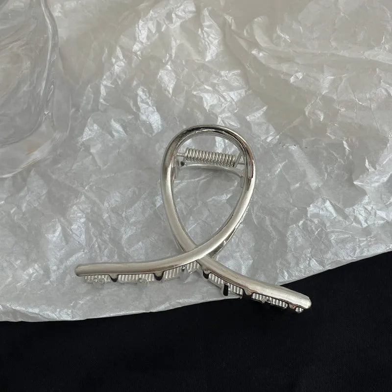 Silver metal hair claw barrette example from a range of 44 Korean-style designs.