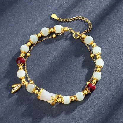 Retro bamboo design bracelet with floral shape and ruyi element in glass and coloured glaze