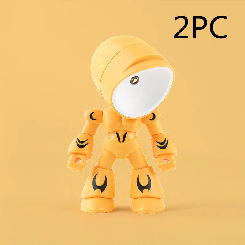 Mini mecha robot hero LED night light with adjustable arms on a desk.