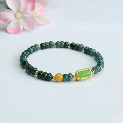 Natural stone blue water jade abacus bead bracelet with electroplated topaz accents and geometric shapes