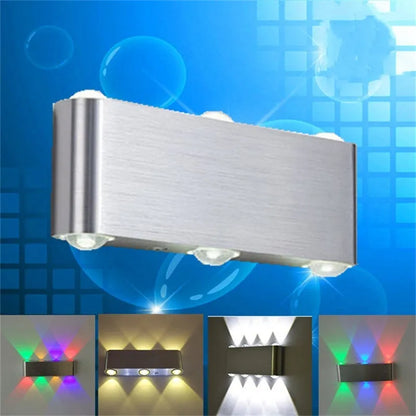 Silver rectangular aluminium LED wall lamp showing multi-colour light options.