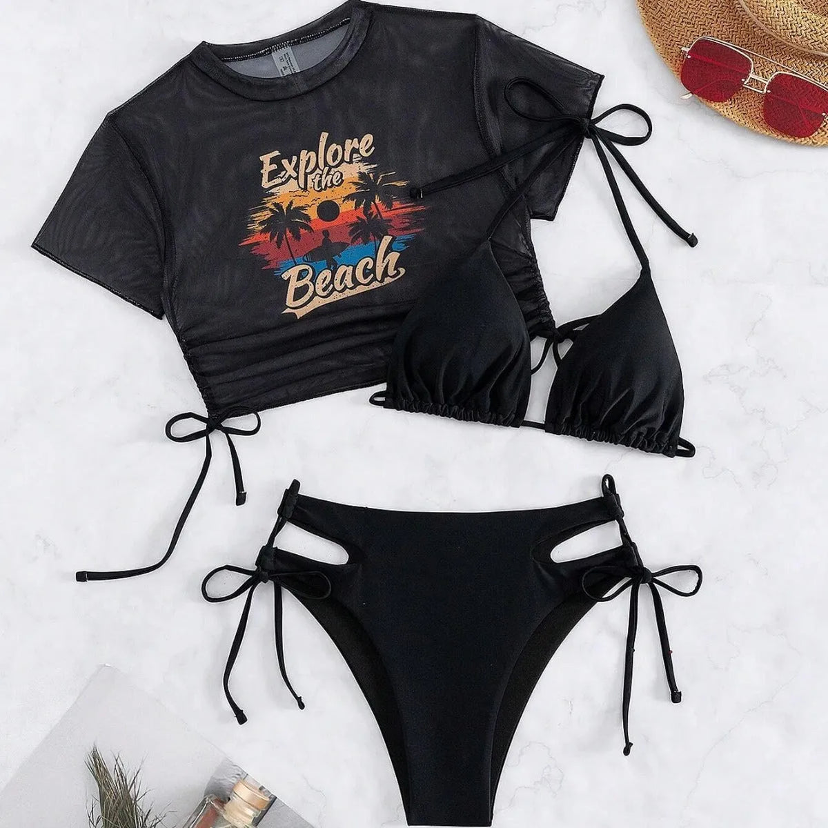 Women's black three-piece bikini swimsuit set with short sleeves