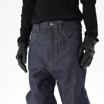 Men's dark blue loose straight-leg denim jeans laid flat, showing front view.