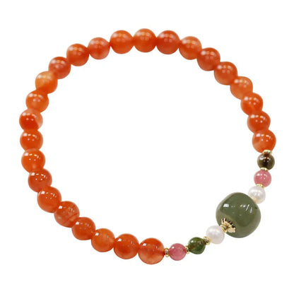 Natural Sichuan cherry red South Red Agate round bead bracelet in retro ethnic style.