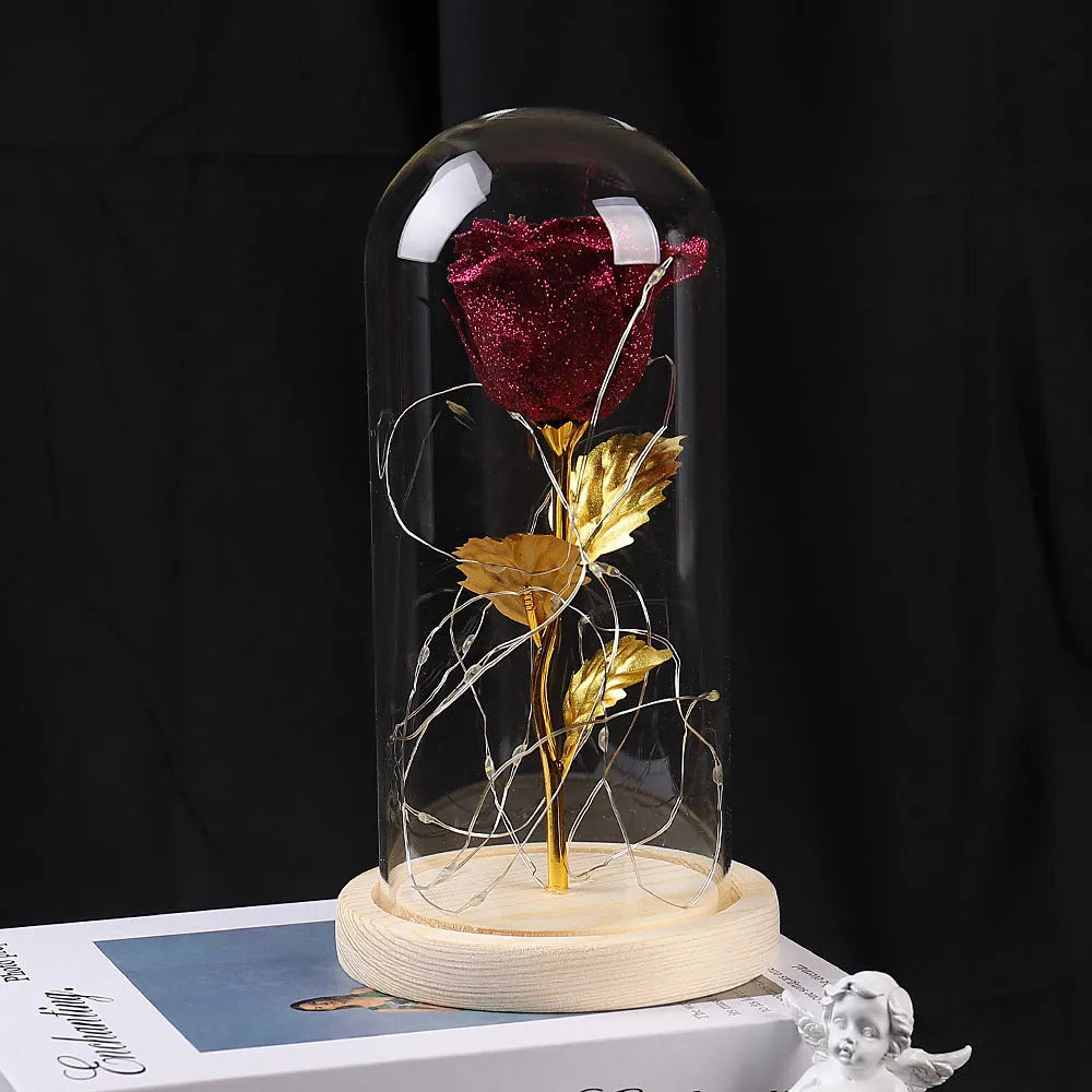 Eternal rose in glass dome with LED string lights, colour options include red, gold, grey, rose red, blue, pink