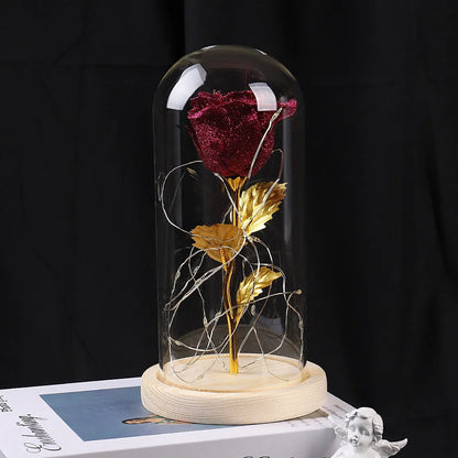 Eternal rose in glass dome with LED string lights, colour options include red, gold, grey, rose red, blue, pink