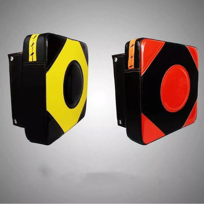 Wall hanging Thai boxing sandbag in black or orange, dimensions 30x30x10cm