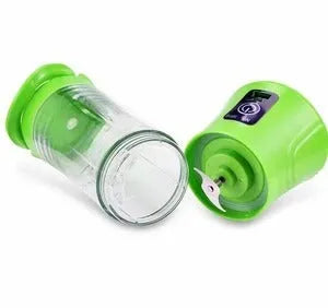 Blue handheld electric fruit juicer with USB port, 400ml cup, and blending blades on a kitchen counter