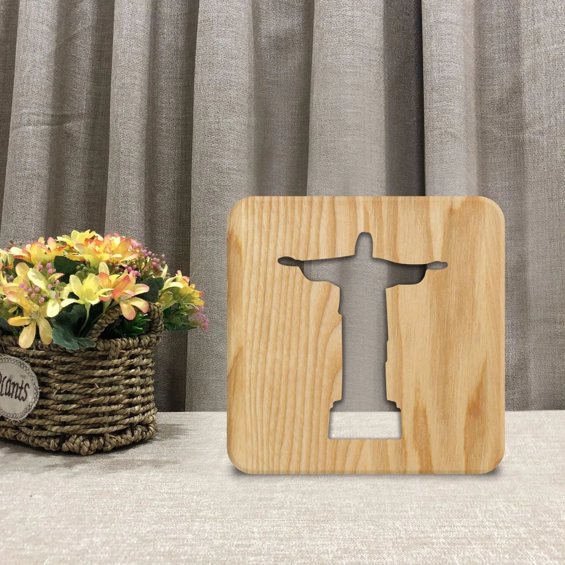 Solid wood hollow night lamp with warm white LED light showing wooden construction and compact dimensions