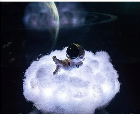 Enchanting cloud-inspired astronaut lamp with a rainbow-like glow, creating a mesmerising and whimsical atmosphere.