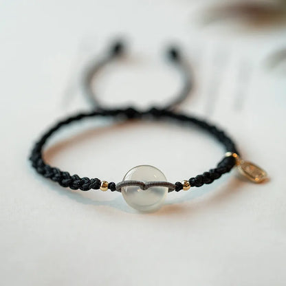 Ethnic style crystal bracelet with vintage woven strap and chamfered square grain details
