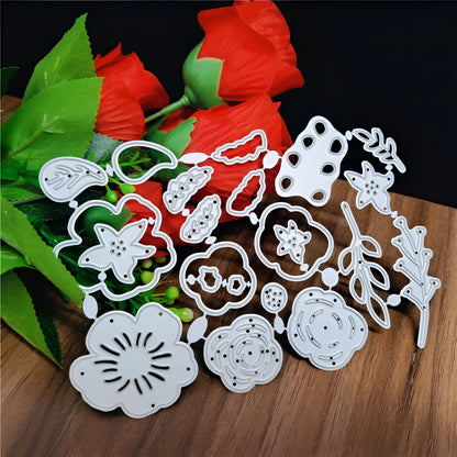 Silver carbon steel floral cutting die for paper crafts measuring 14.3 by 9.9 cm.