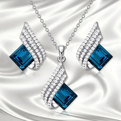 Necklace and earring set with alloy pendant and cross chain in two colour options.
