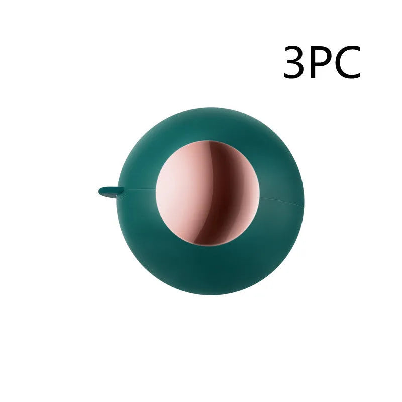 Reusable gel lint roller ball in green gold colour for removing pet hair and lint from fabrics.
