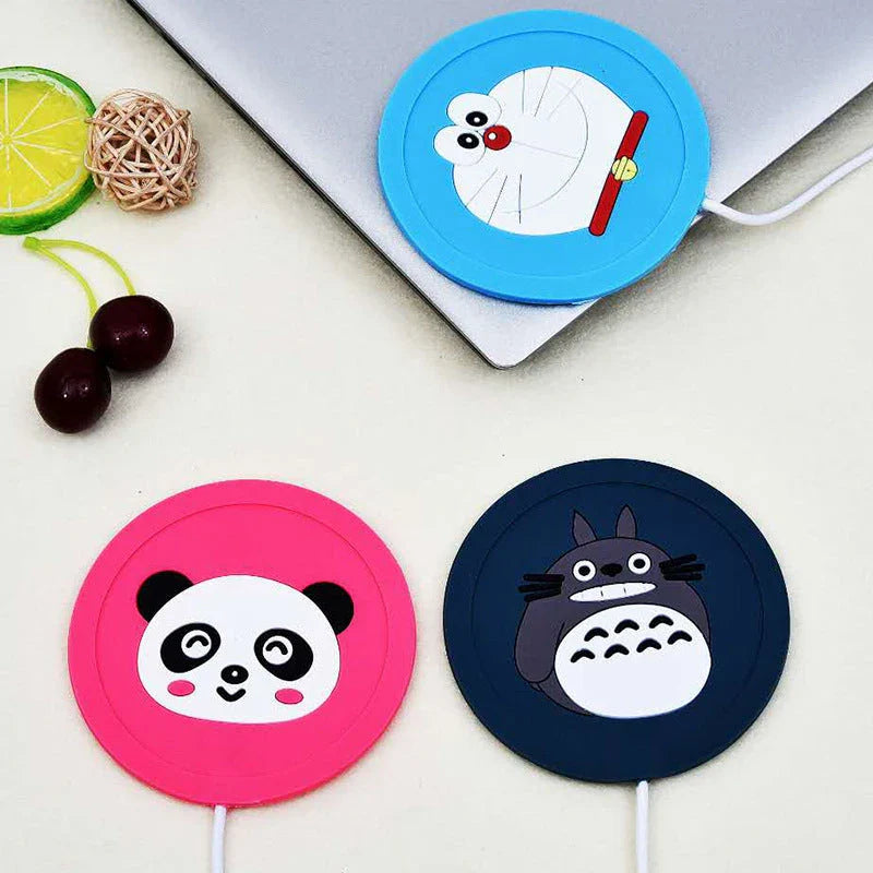 Cosy USB-powered heating pad with a soft rubber construction and a playful animal-inspired design, perfect for keeping mugs and cups warm