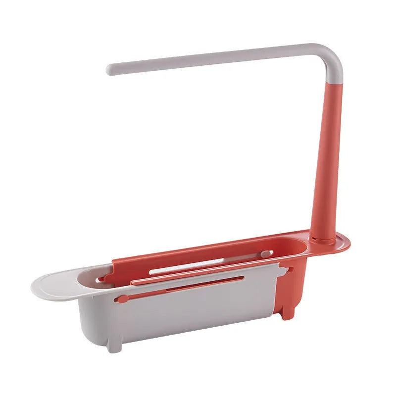 Telescopic plastic kitchen sink drain rack with multi-coloured modular baskets.