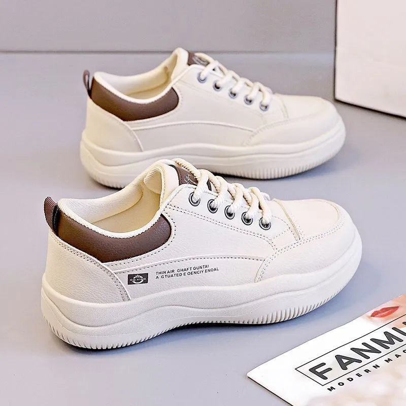 Women's white Korean-style lace-up pumps with cross straps and a 3-5 cm mid-heel on a rubber sole.