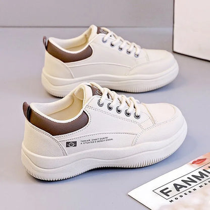 Women's white Korean-style lace-up pumps with cross straps and a 3-5 cm mid-heel on a rubber sole.