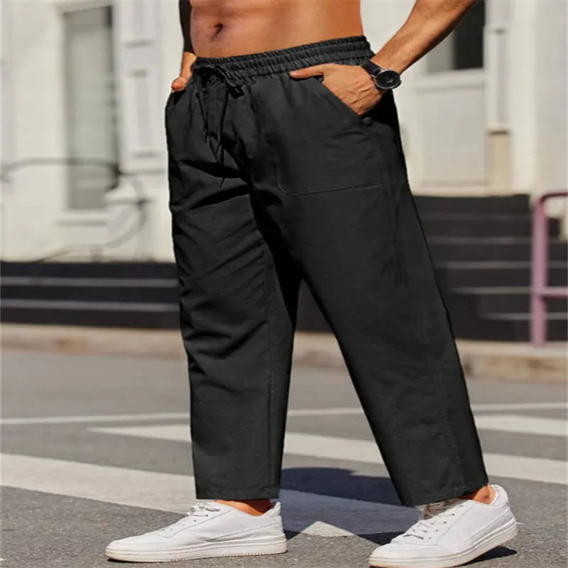 Men's straight-leg linen trousers with an elastic waist in a solid colour