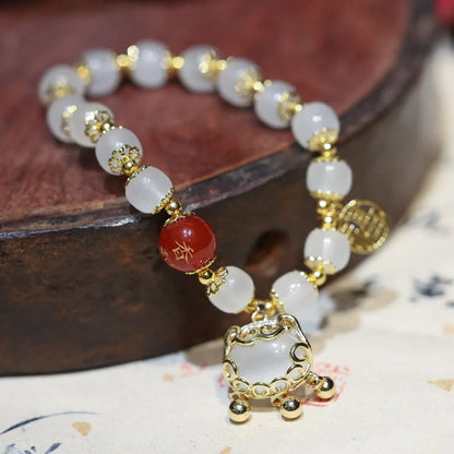 Women's Chinese-style glass bracelet with safety lock charm in choice of three colour options