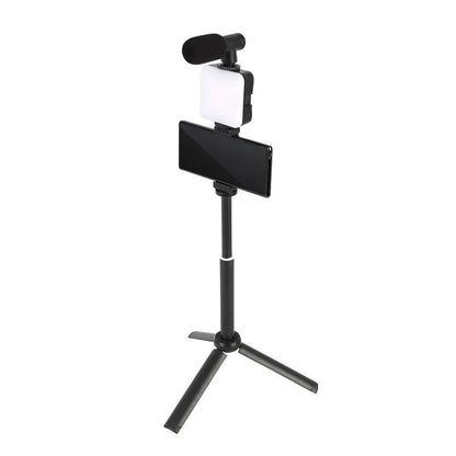 Square LED camera flash with universal hot shoe mount and rotatable head, shown with optional octopus stand tripod.
