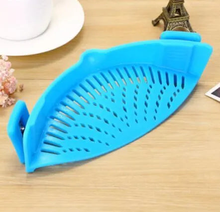 Silicone clip-on pot strainer in multiple colours for draining liquids, with buckle design and uniform hollow pattern