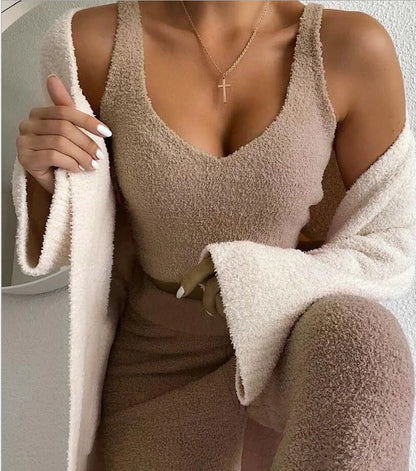 A cozy 3-piece loungewear set featuring a long sleeve crop top and drawstring shorts in a variety of stylish colors.